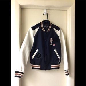 Coach 1941 classic varsity Jacket worn by Lili Reinhart in “Riverdale” 2017.